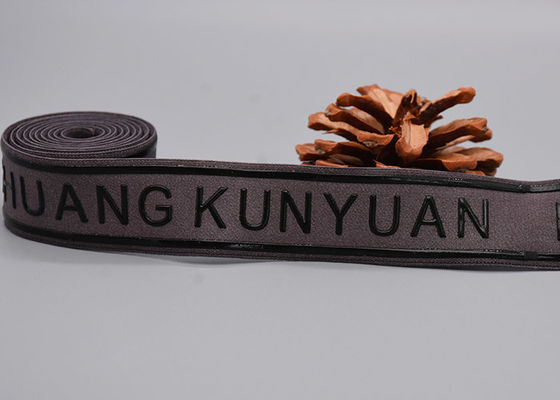 Os vestuários usam não a faixa de elástico do deslizamento com logotipo brilhante impresso costume do silicone