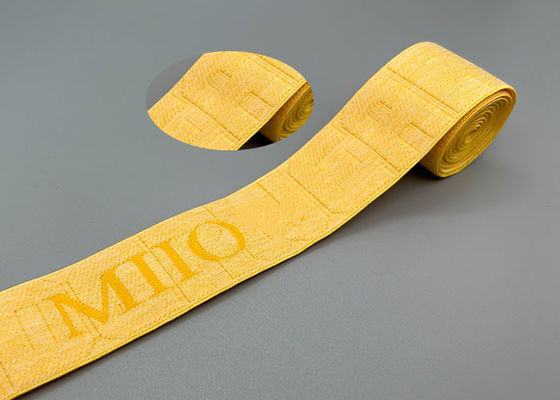 O término do ciclo personalizou a faixa de elástico fraca do jacquard de 35mm para a roupa